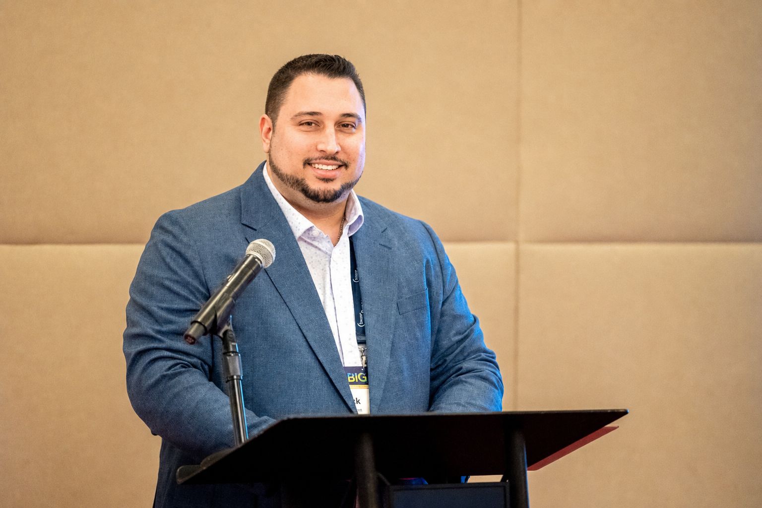 Nicholas Johnson speaking on stage